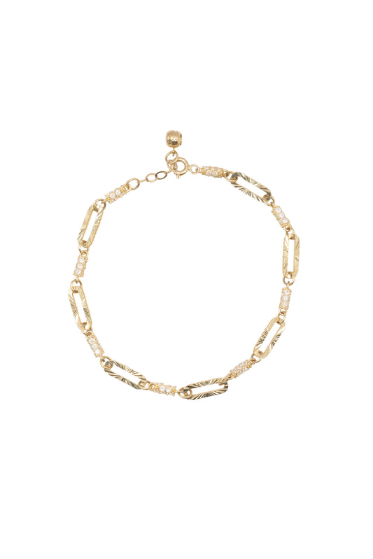 Pulseras 10 kilates eslabones barril tupidos de zirconias y óvalos alargados..png