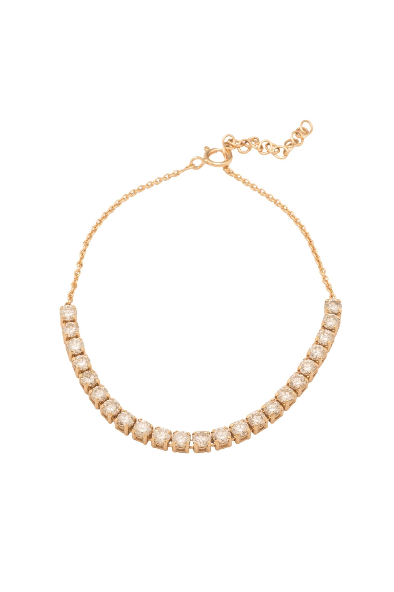 Pulso de oro sólido en 14 kilates con media tenis de diamantes de 1.88 ct..png