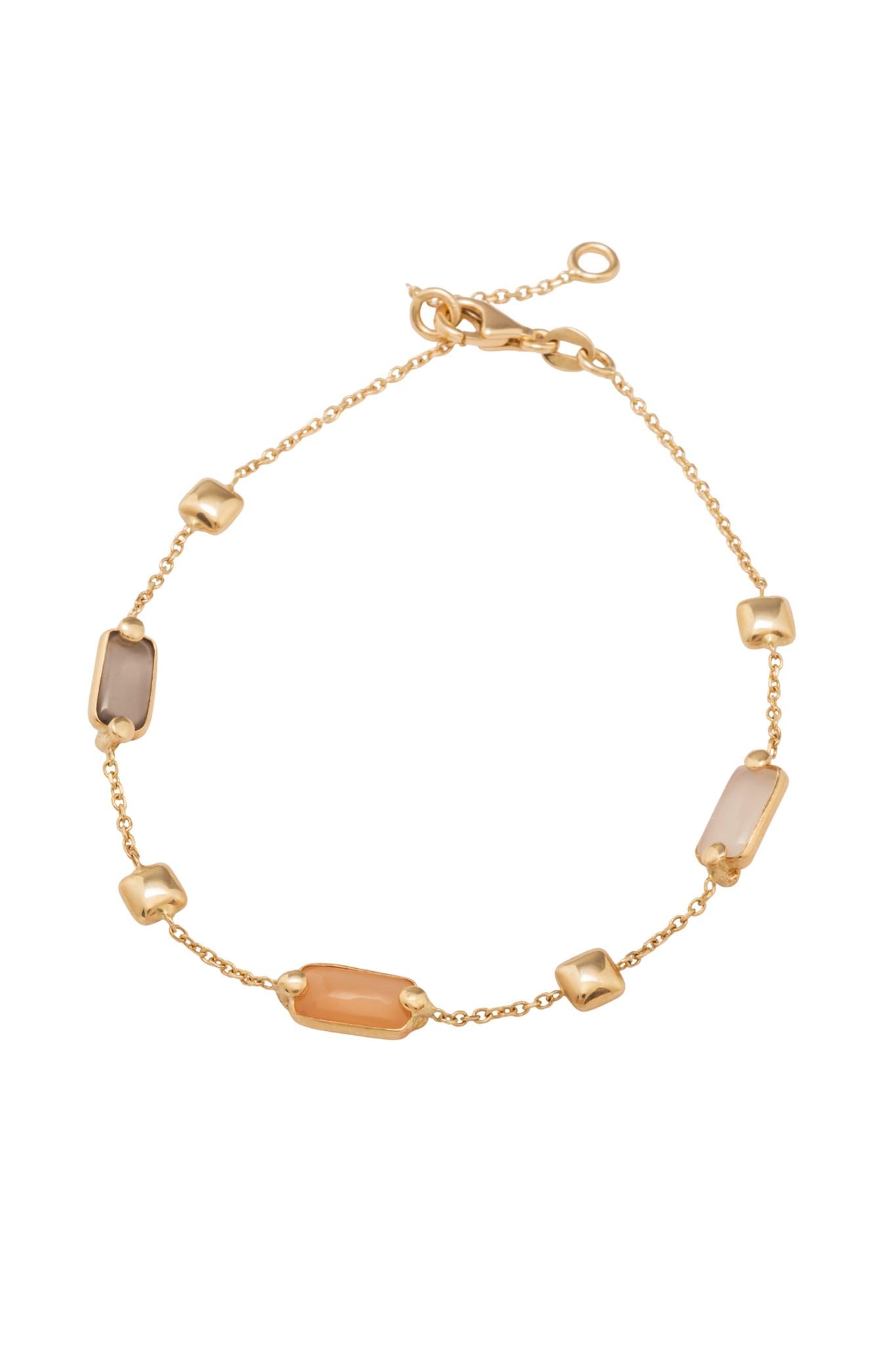 Pulso de oro sólido en 14 kilates con sun stone de distintos colores rectangulares biselados y cubos de oro amarillo..png