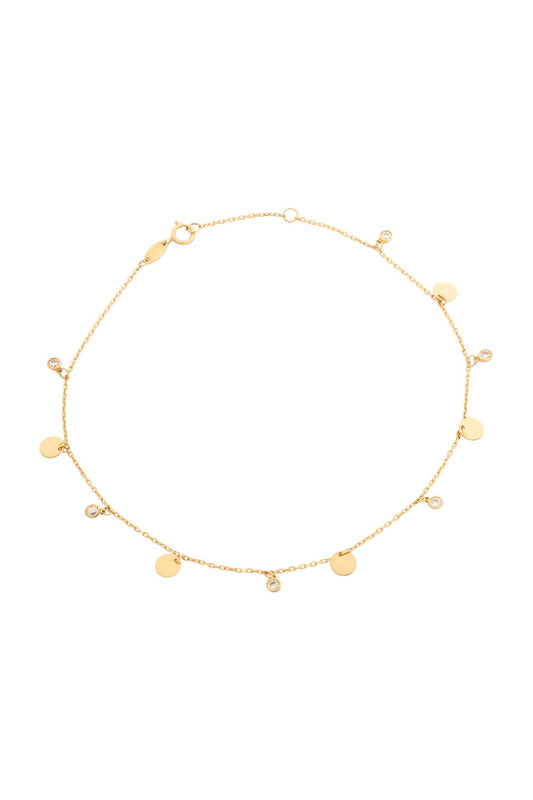 Tobillera en 10 kilates con zirconias diamantadas y círculos lisos.png